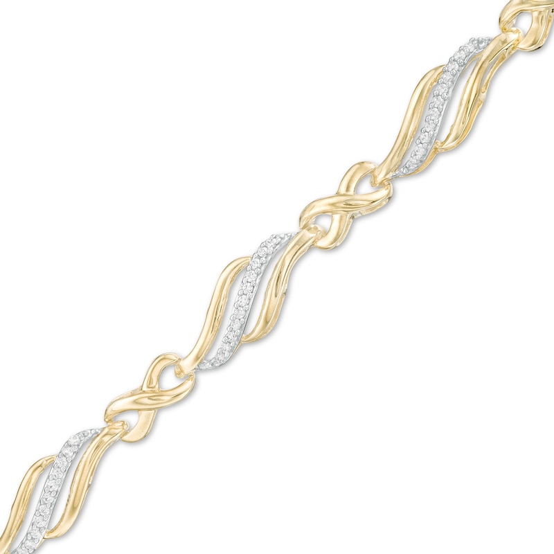 1/4 CT. T.W. Diamond Alternating Infinity Bracelet in 10K Gold – 7.5"