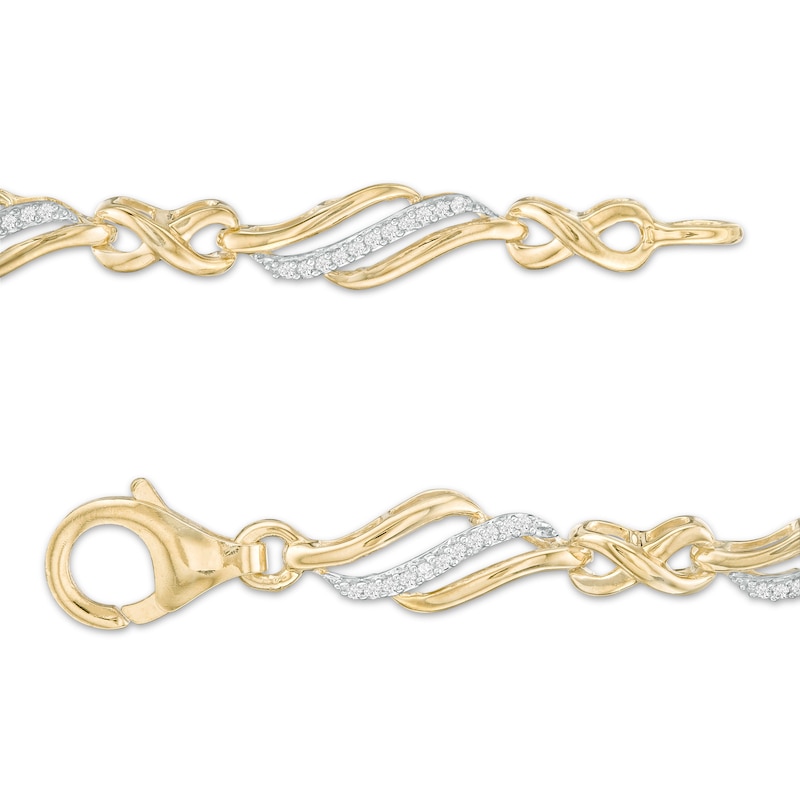 1/4 CT. T.W. Diamond Alternating Infinity Bracelet in 10K Gold – 7.5"
