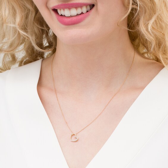 1/10 CT. T.w. Diamond Tilted Heart Pendant in 10K Gold