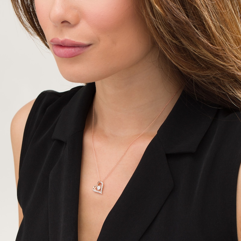 Main Image 2 of 1/15 CT. T.W. Diamond Tilted Double Heart Outline Pendant in Sterling Silver with 14K Rose Gold Plate