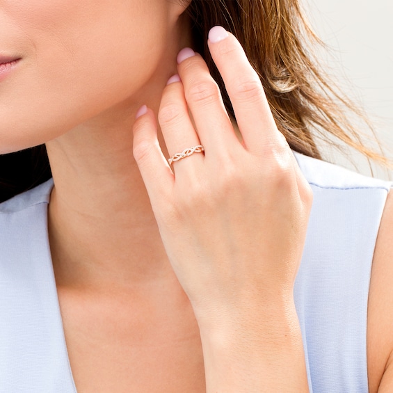 1/6 CT. T.w. Diamond Twist Anniversary Band in 10K Rose Gold