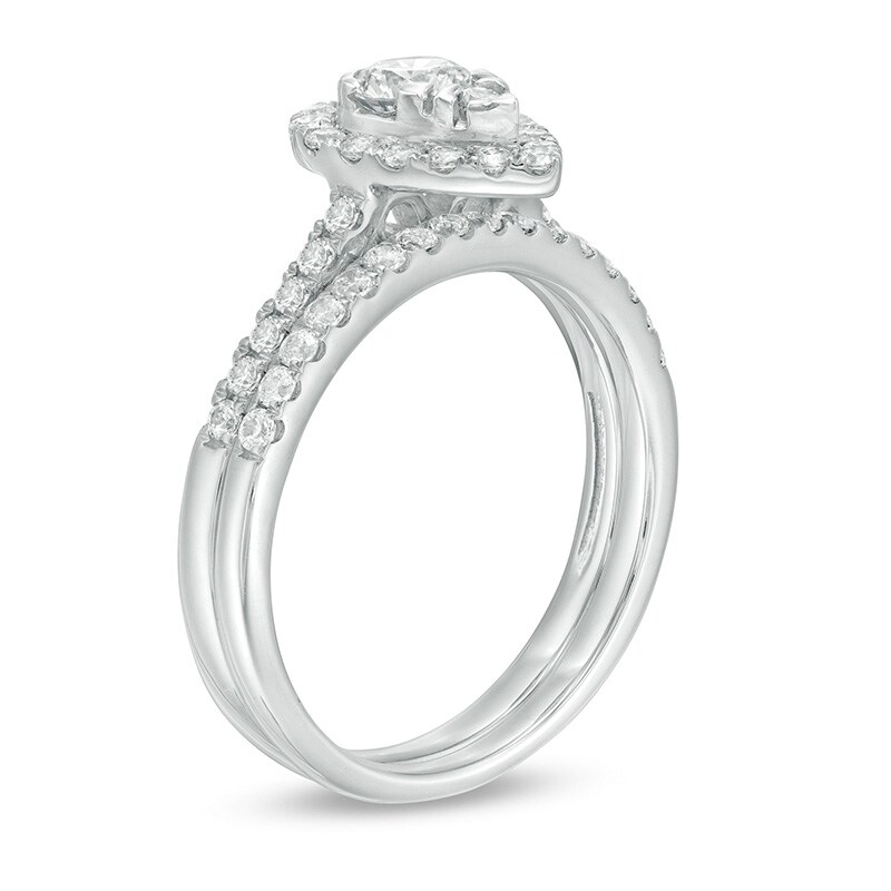 1 CT. T.W. Pear-Shaped Multi-Diamond Frame Bridal Set in 10K White Gold