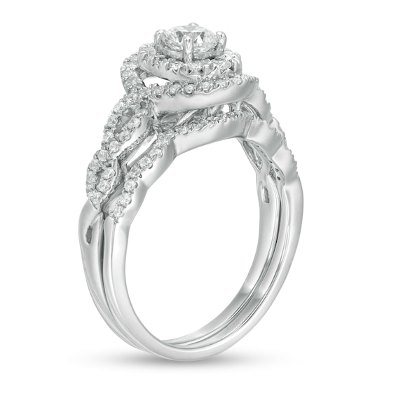 1 CT. T.w. Diamond Double Oval Frame Twist Shank Bridal Set in 10K White Gold
