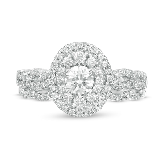 1 CT. T.w. Diamond Double Oval Frame Twist Shank Bridal Set in 10K White Gold