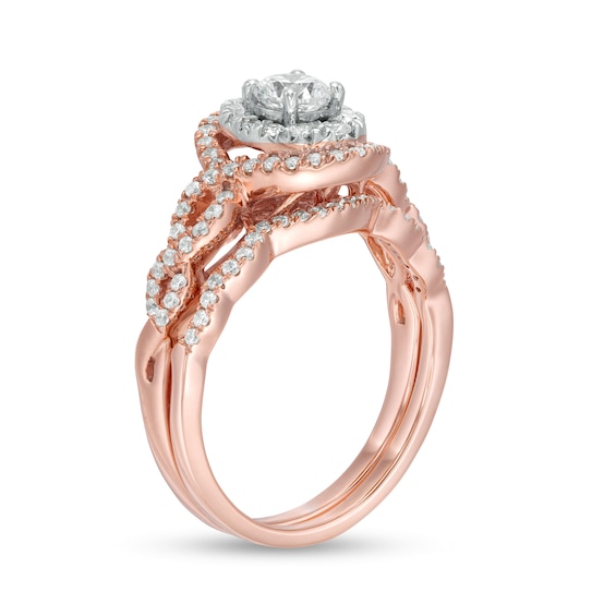 1 CT. T.w. Diamond Double Oval Frame Twist Shank Bridal Set in 10K Rose Gold