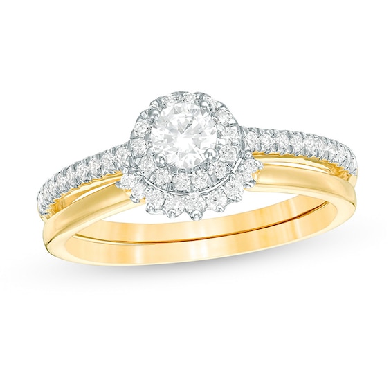 1/2 CT. T.w. Diamond Frame Bridal Set in 10K Gold