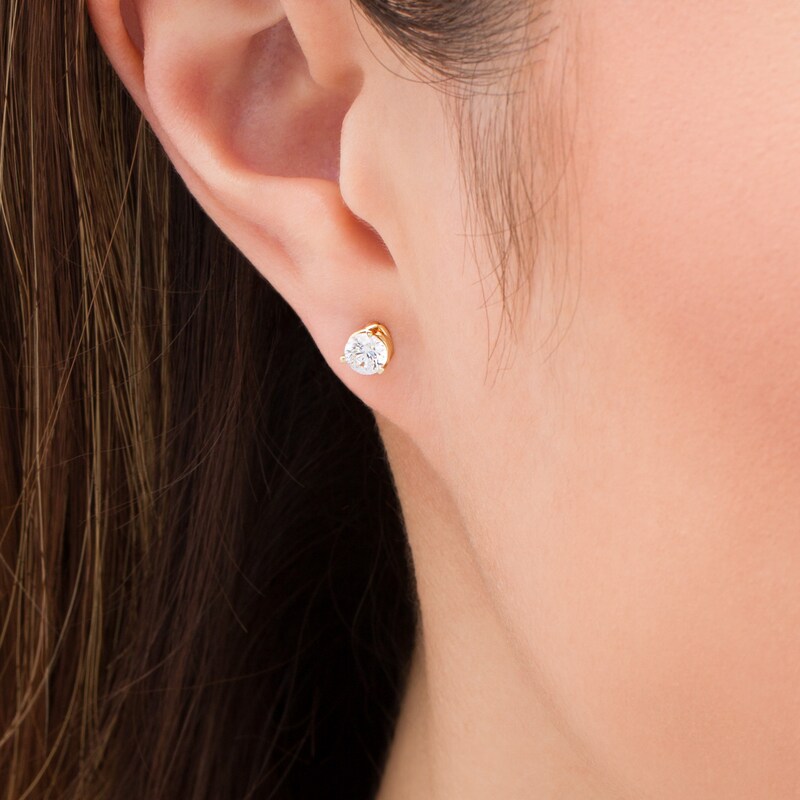 Main Image 2 of Zales Private Collection 5/8 CT. T.W. Certified Colourless Diamond Solitaire Stud Earrings in 14K Gold (F/I1)
