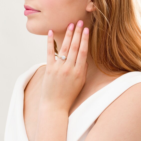 1/2 CT. T.w. Diamond Frame Bridal Set in 10K Gold