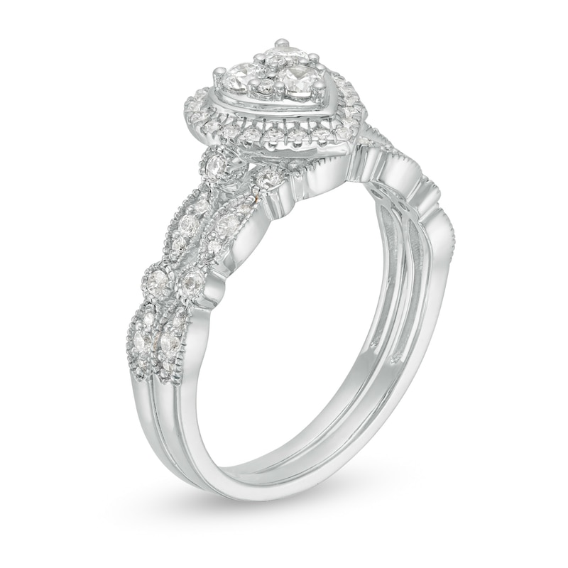 1/2 CT. T.W. Multi-Diamond Heart Frame Alternating Marquise Vintage-Style Bridal Set in 10K White Gold