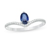 Thumbnail Image 1 of Oval Lab-Created Blue Sapphire and 1/10 CT. T.W. Diamond Chevron Ring in 10K White Gold