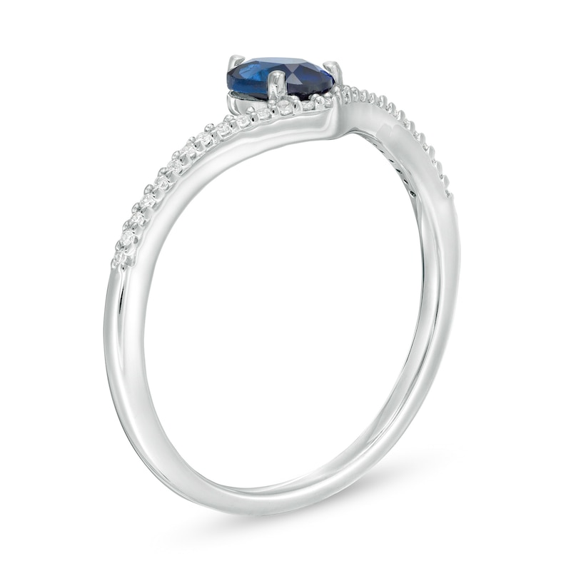 Main Image 3 of Oval Lab-Created Blue Sapphire and 1/10 CT. T.W. Diamond Chevron Ring in 10K White Gold
