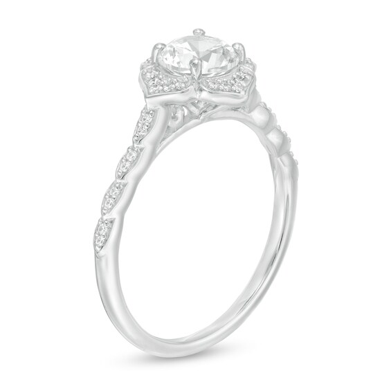 6.0mm Lab-Created White Sapphire and 1/8 CT. T.w. Diamond Frame Flower Ring in 10K White Gold