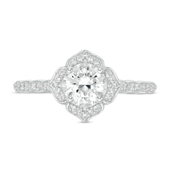 6.0mm Lab-Created White Sapphire and 1/8 CT. T.w. Diamond Frame Flower Ring in 10K White Gold