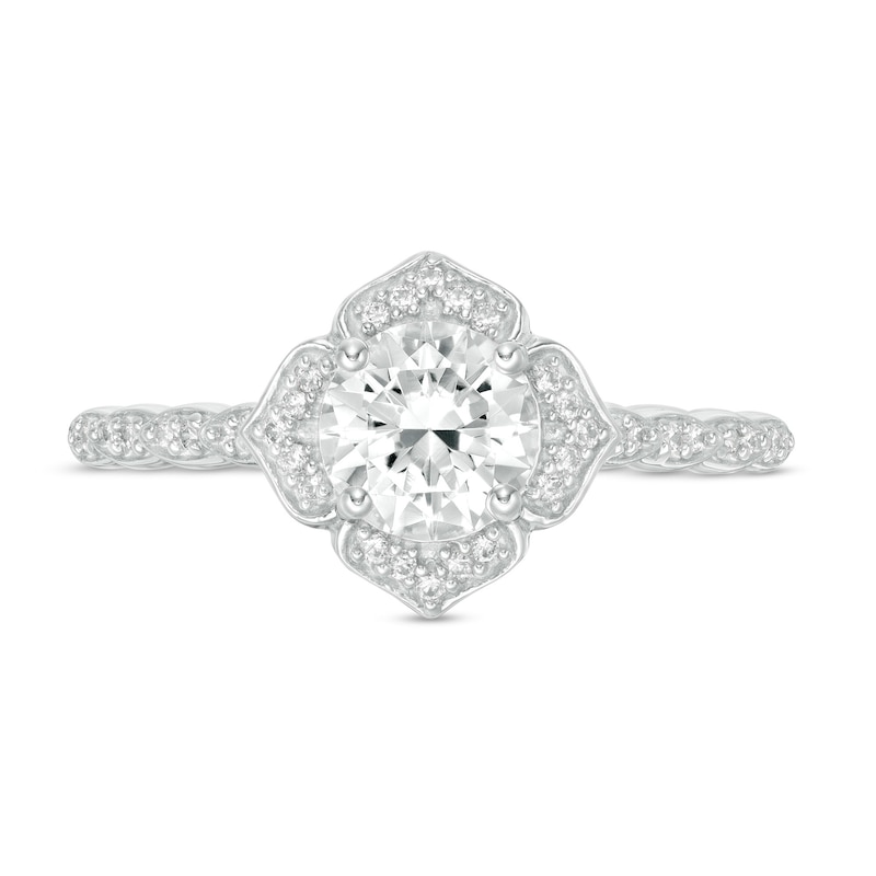 6.0mm Lab-Created White Sapphire and 1/8 CT. T.W. Diamond Frame Flower Ring in 10K White Gold