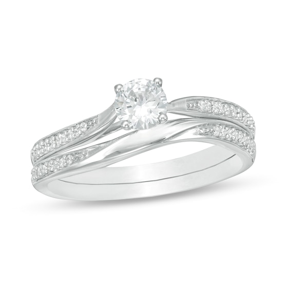 4.5mm Lab-Created White Sapphire and 1/8 CT. T.w. Diamond Waves Bridal Set in 10K White Gold