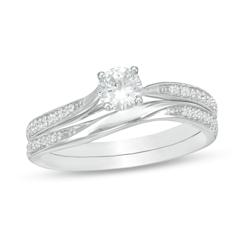 Main Image 1 of 4.5mm Lab-Created White Sapphire and 1/8 CT. T.W. Diamond Waves Bridal Set in 10K White Gold