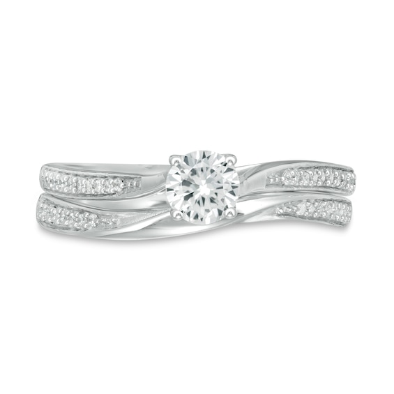 4.5mm Lab-Created White Sapphire and 1/8 CT. T.w. Diamond Waves Bridal Set in 10K White Gold
