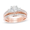 Thumbnail Image 0 of 5.4mm Lab-Created White Sapphire Three Stone Bridal Set in 10K Rose Gold