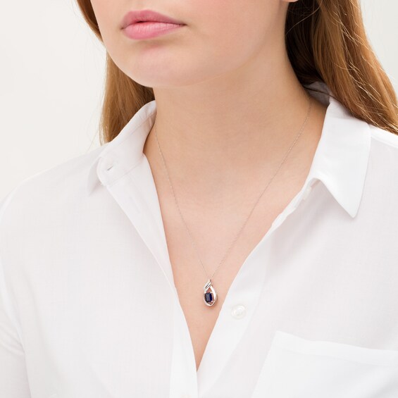 Emerald-Cut Lab-Created Blue Sapphire and Diamond Accent Flame Pendant in 10K White Gold Emerald-Cut Lab-Created Blue Sapphire and Diamond Accent Flame Pendant in 10K White Gold
