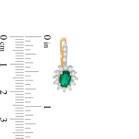 Oval Lab-Created Emerald and 1/3 CT. T.W. Diamond Starburst Frame Drop Earrings in 10K Gold Oval Lab-Created Emerald and 1/3 CT. T.W. Diamond Starburst Frame Drop Earrings in 10K Gold