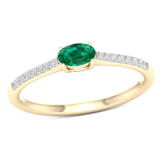 Sideways Oval Emerald and 1/15 CT. T.W. Diamond Stackable Ring in 10K