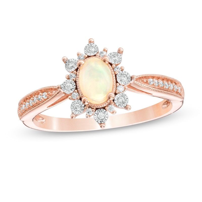 Main Image 1 of Oval Opal and 1/10 CT. T.W. Diamond Sunburst Frame Vintage-Style Tapered Shank Ring in 10K Rose Gold
