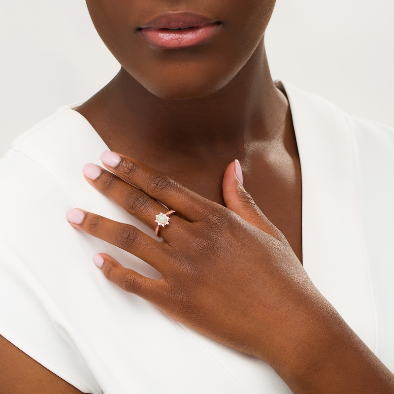 Main Image 2 of Oval Opal and 1/10 CT. T.W. Diamond Sunburst Frame Vintage-Style Tapered Shank Ring in 10K Rose Gold
