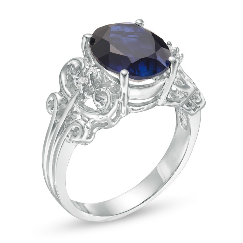 Main Image 3 of Oval Lab-Created Blue Sapphire and 1/20 CT. T.W. Diamond Vintage-Style Scroll Ring in 10K White Gold