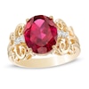Thumbnail Image 1 of Oval Lab-Created Ruby and 1/20 CT. T.W. Diamond Vintage-Style Scroll Ring in 10K Gold