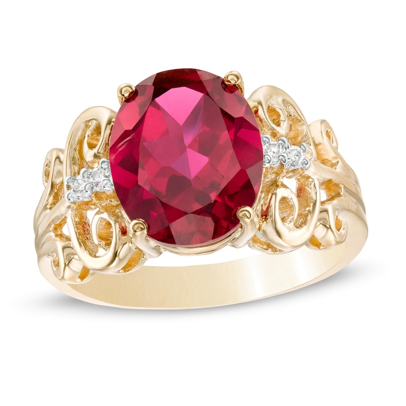 Oval Lab-Created Ruby and 1/20 CT. T.W. Diamond Vintage-Style Scroll Ring in 10K Gold