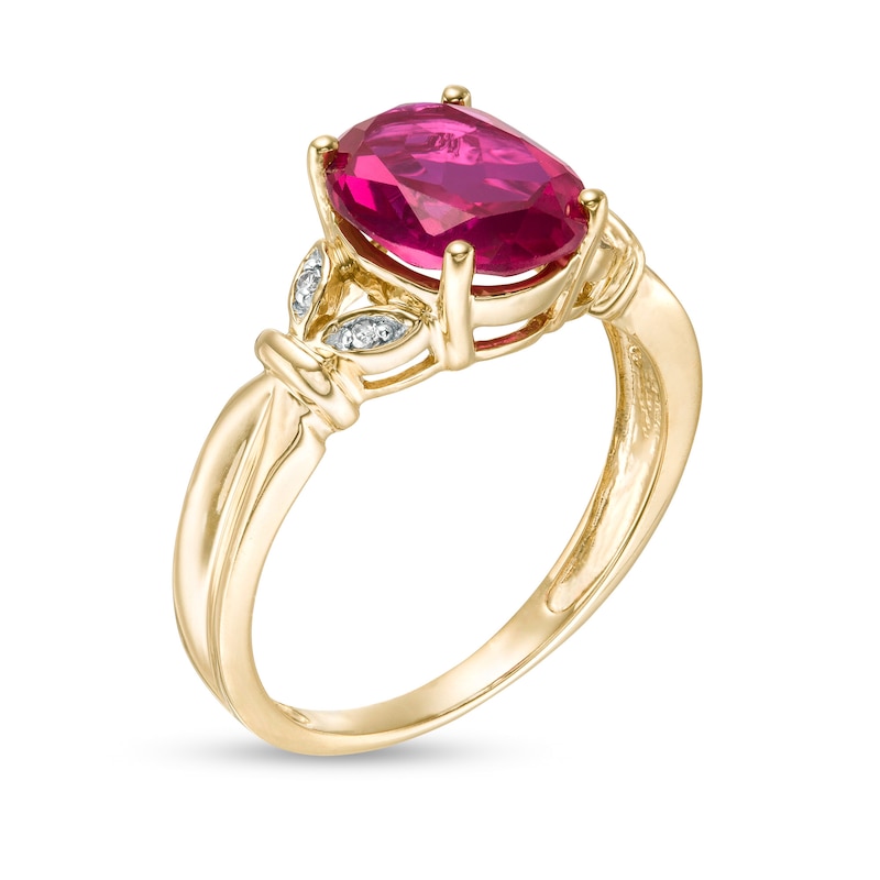 Oval Lab-Created Ruby and Diamond Accent Leaf Split Shank Ring in 10K Gold