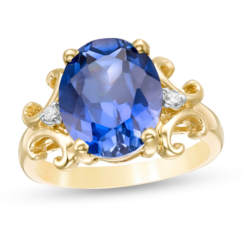 Main Image 1 of Oval Lab-Created Blue Sapphire and 1/20 CT. T.W. Diamond Scroll Frame Ring in 10K Gold