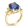 Thumbnail Image 3 of Oval Lab-Created Blue Sapphire and 1/20 CT. T.W. Diamond Scroll Frame Ring in 10K Gold