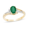 Thumbnail Image 1 of Oval Emerald and 1/20 CT. T.W. Diamond Vintage-Style Split Shank Ring in 10K Gold