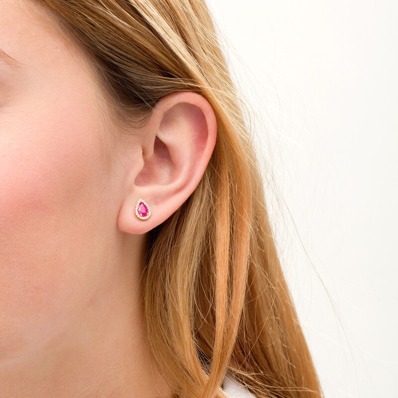 Main Image 2 of Pear-Shaped Ruby and 1/8 CT. T.W. Diamond Frame Stud Earrings in 10K Gold