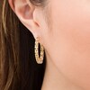 Thumbnail Image 1 of Oval Citrine Inside-Out Hoop Earrings in Sterling Silver