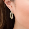 Oval Peridot Inside-Out Hoop Earrings in Sterling Silver