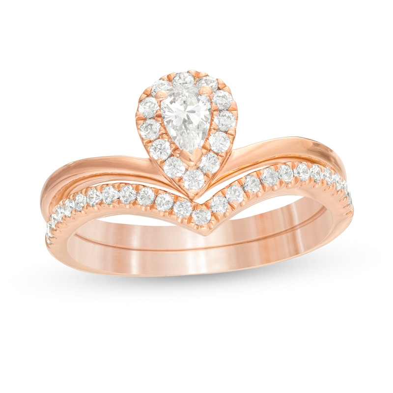 Main Image 1 of 1/2 CT. T.W. Pear-Shaped Diamond Frame Chevron Bridal Set in 14K Rose Gold