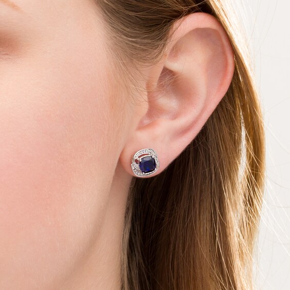 6.0mm Cushion-Cut Lab-Created Blue Sapphire and 1/10 CT. T.W. Diamond Swirl Frame Stud Earrings in Sterling Silver 6.0mm Cushion-Cut Lab-Created Blue Sapphire and 1/10 CT. T.W. Diamond Swirl Frame Stud Earrings in Sterling Silver