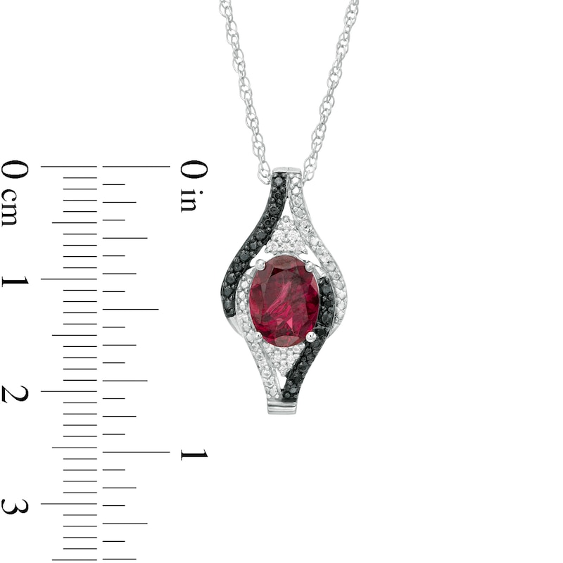 Oval Garnet and 1/10 CT. T.W. White and Black Diamond Bypass Frame Pendant in Sterling Silver
