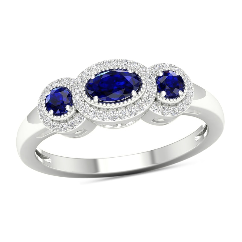 Main Image 1 of Blue Sapphire and 1/8 CT. T.W. Diamond Frame Three Stone Vintage-Style Ring in 10K White Gold