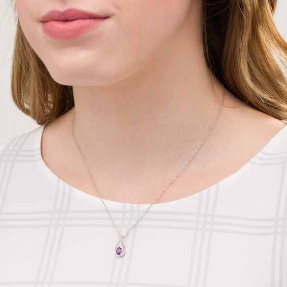 Oval Amethyst and 1/20 CT. T.w. Diamond Teardrop Pendant in 10K White Gold