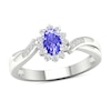 Thumbnail Image 1 of Oval Tanzanite and 1/8 CT. T.W. Diamond Sunburst Frame Twist Shank Ring in 10K White Gold