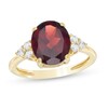 Thumbnail Image 1 of Oval Garnet and White Topaz Tri-Sides Ring in 10K Gold