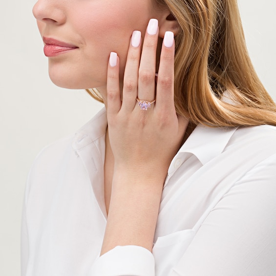 Emerald-Cut Pink Quartz and 1/6 CT. T.W. Diamond Three Stone Ring in 14K Rose Gold - Size 7 Emerald-Cut Pink Quartz and 1/6 CT. T.W. Diamond Three Stone Ring in 14K Rose Gold - Size 7