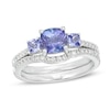 Thumbnail Image 1 of Cushion-Cut Tanzanite and 1/4 CT. T.W. Diamond Three Stone Bridal Set in 14K White Gold - Size 7