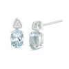 Thumbnail Image 0 of Oval Aquamarine and 1/20 CT. T.W. Triangular Composite Diamond Drop Earrings in 10K White Gold