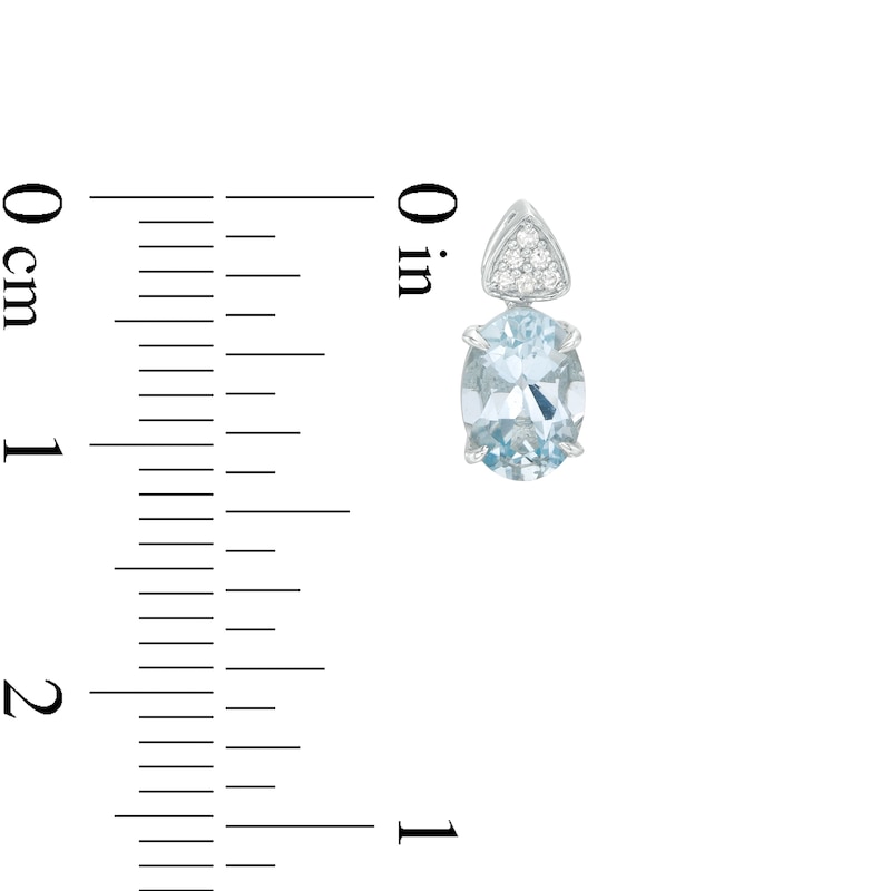 Oval Aquamarine and 1/20 CT. T.W. Triangular Composite Diamond Drop Earrings in 10K White Gold