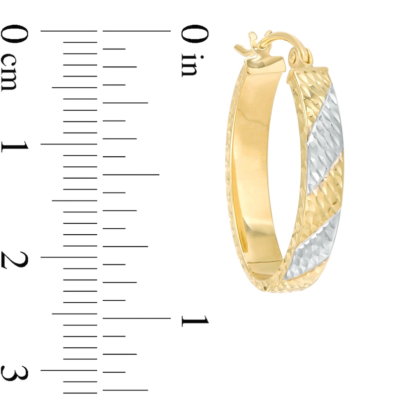 Main Image 3 of 23.0mm Diamond-Cut Striped Oval Hoop Earrings in 10K Two-Tone Gold