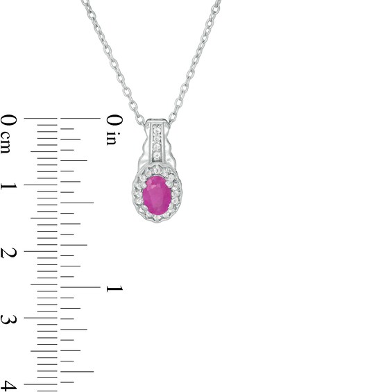 Oval Ruby and White Topaz Frame Three Piece Set in Sterling Silver